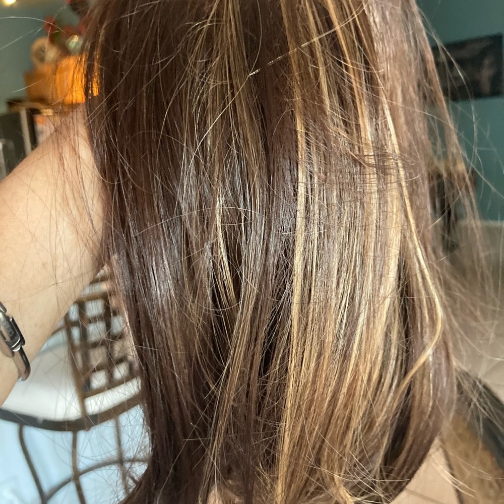 Shoulder length, straight, brown wig.